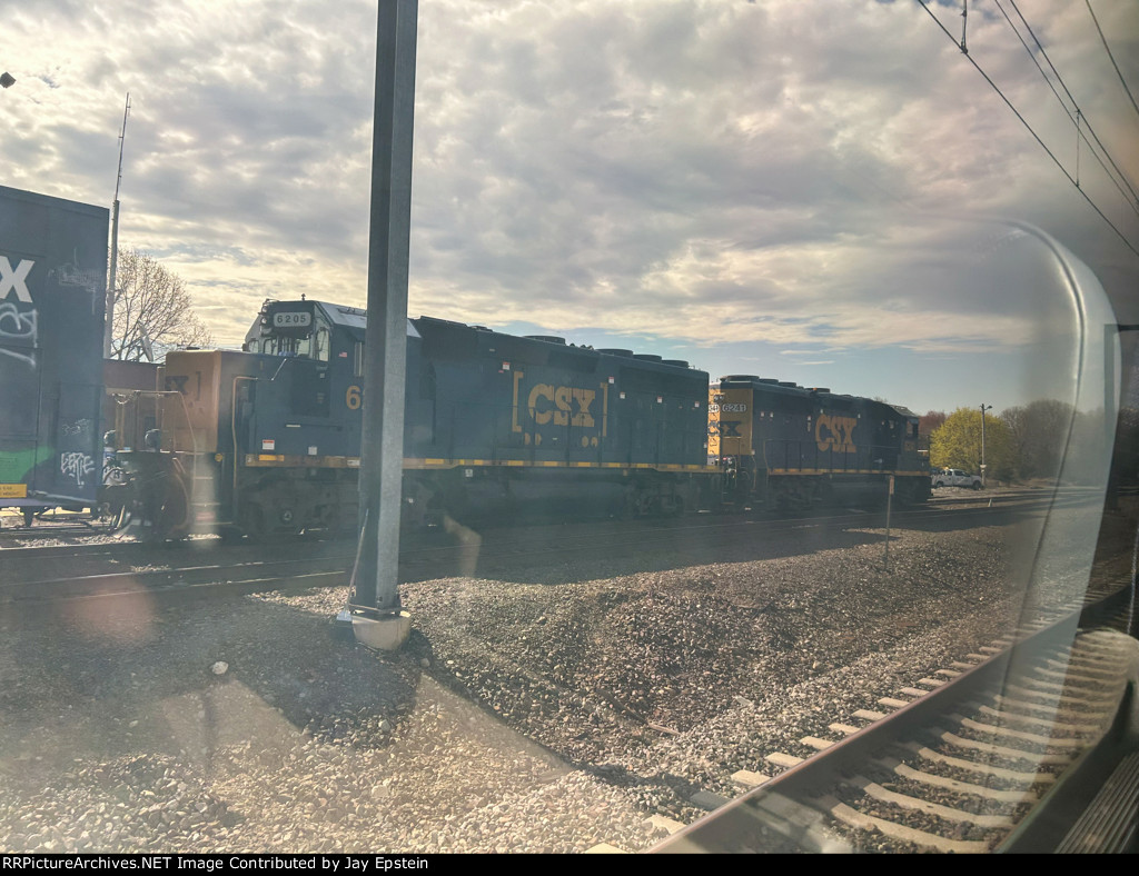 Two CSX Geeps wait to depart Readville
